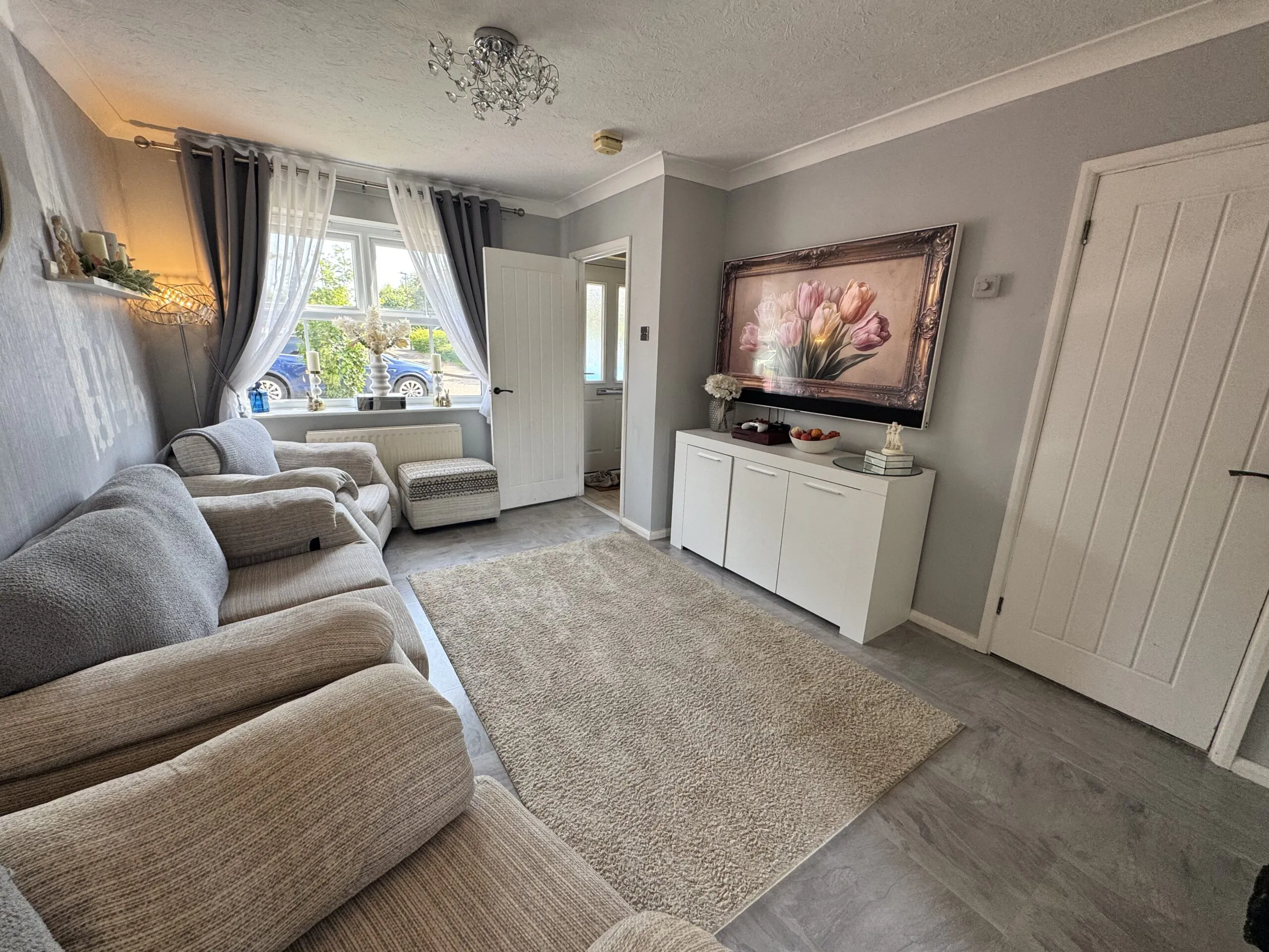 Living room and kitchen in a Witham rental property
